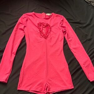 Fashion Nova Pink Long Sleeve Heart Cutout Romper